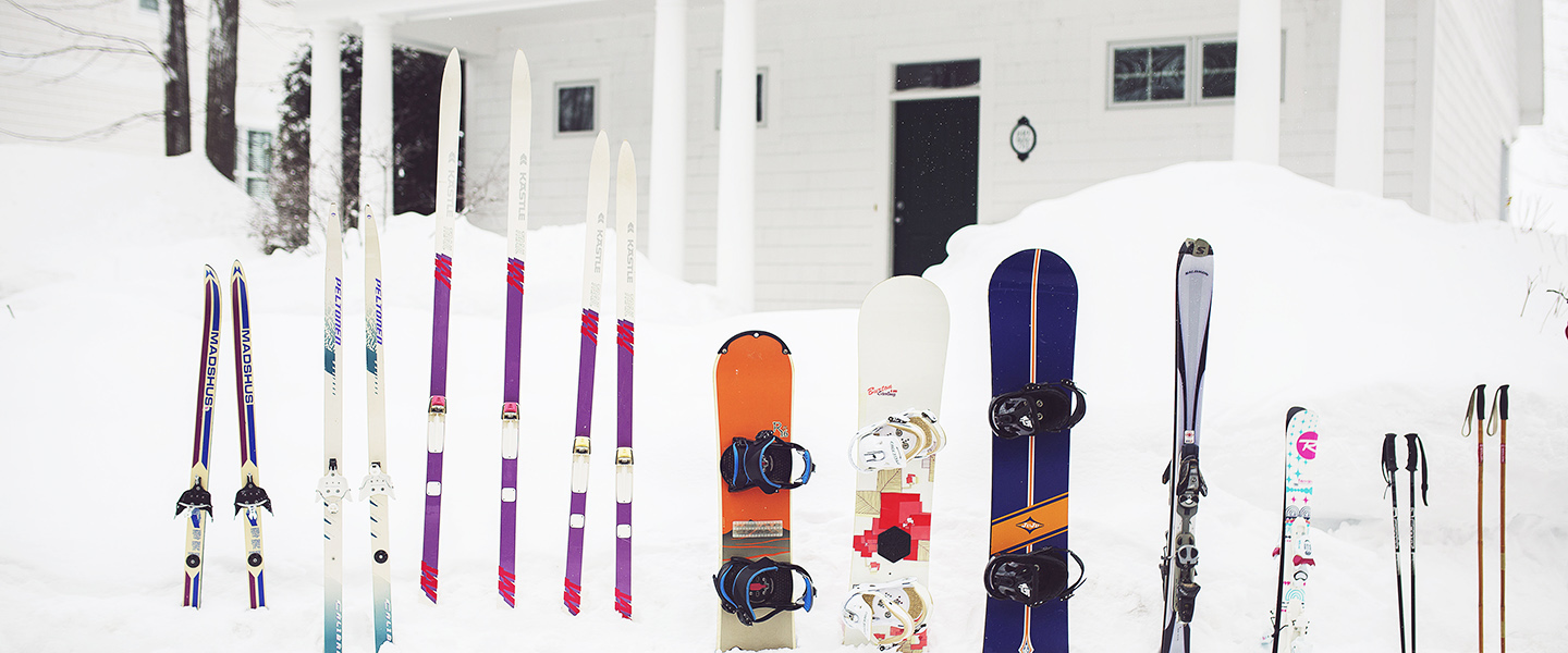 Skis and snowboards outside Cottages at Bay Harbor