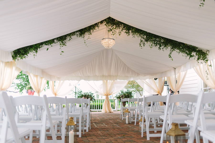 Tented outdoor wedding ceremony on The Sagamore Room's terrace