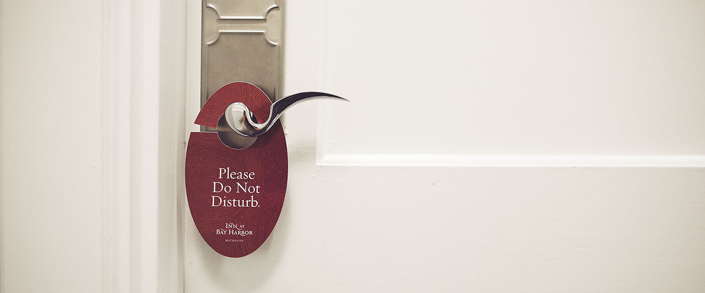 Do Not Disturb sign on hotel room door