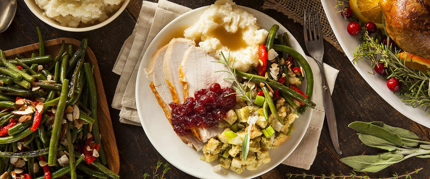 Thanksgiving traditional meal of turkey, green beans, vegetables